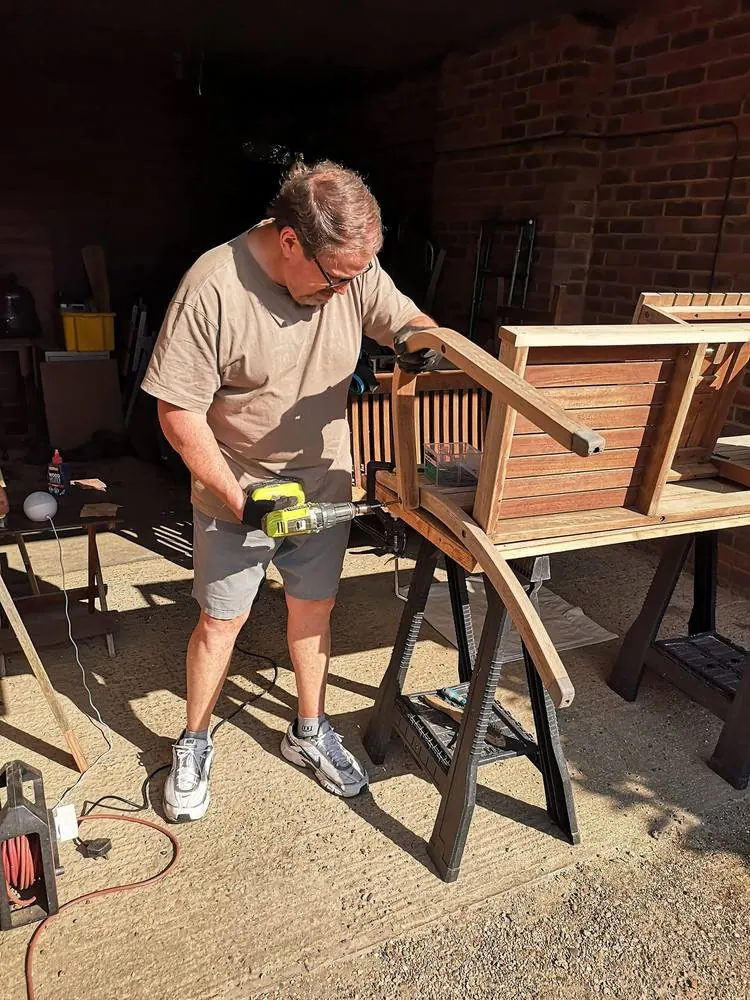 Sean shaping timber in the workshop